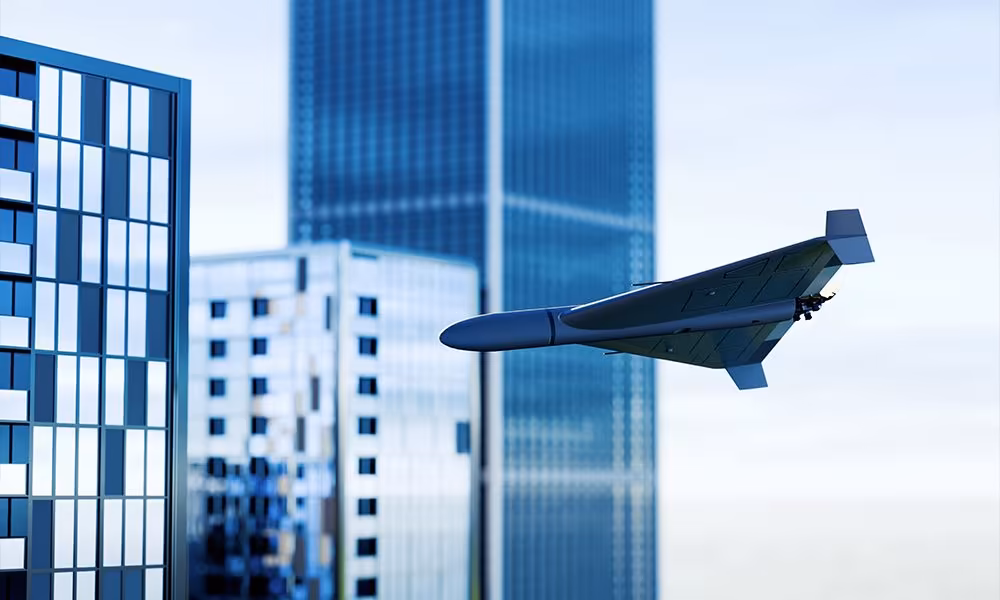 Drone entre immeubles, univers visuel CAP4LAND avec Qreative