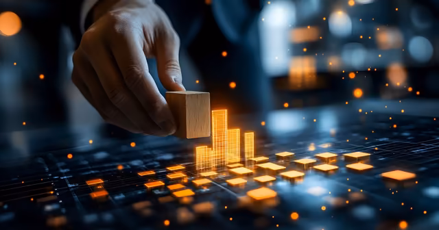 Main ajustant des blocs virtuels sur un graphique digital en expansion
