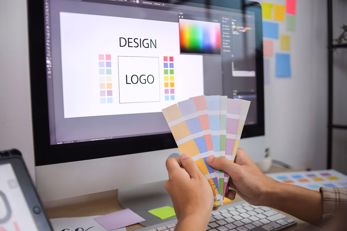 Colour swatches beside an on-screen logo: Qreative recommends testing