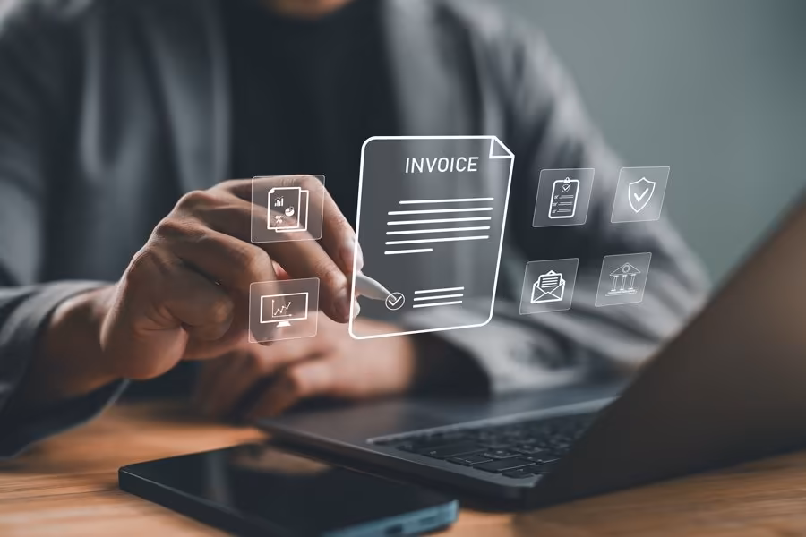 Qreative interacting with electronic invoices interface on screen