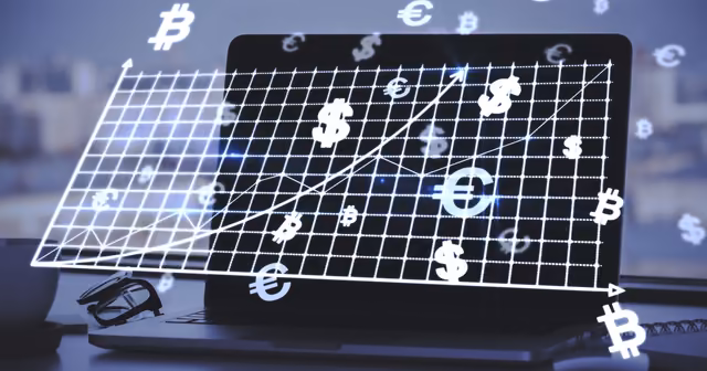 Graphique financier et symboles monétaires sur ordinateur portable