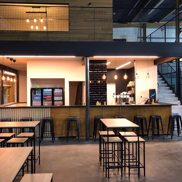 Lounge area of Eleven Padel club featured on their premium website
