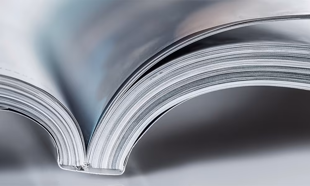 Open brochure symbolizing clarity, structure, and attention to detail in a WordPress website